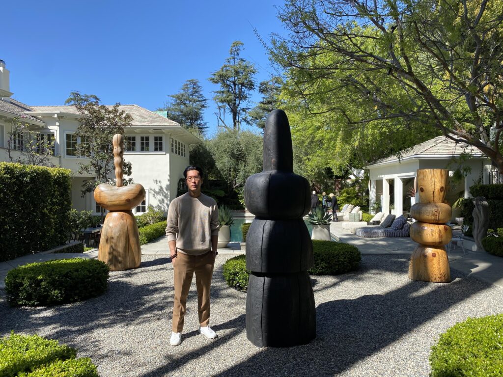 FAME | Luxury Architecture & Interior Design David Bruce Lee Architect with FAME in the garden with Dan Anderson sculptures