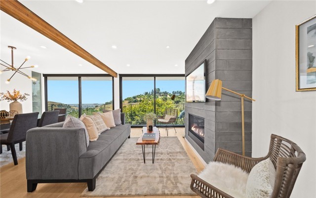 Northeast Los Angeles Home Sales Reach Eight Month Record. Family room with fireplace views