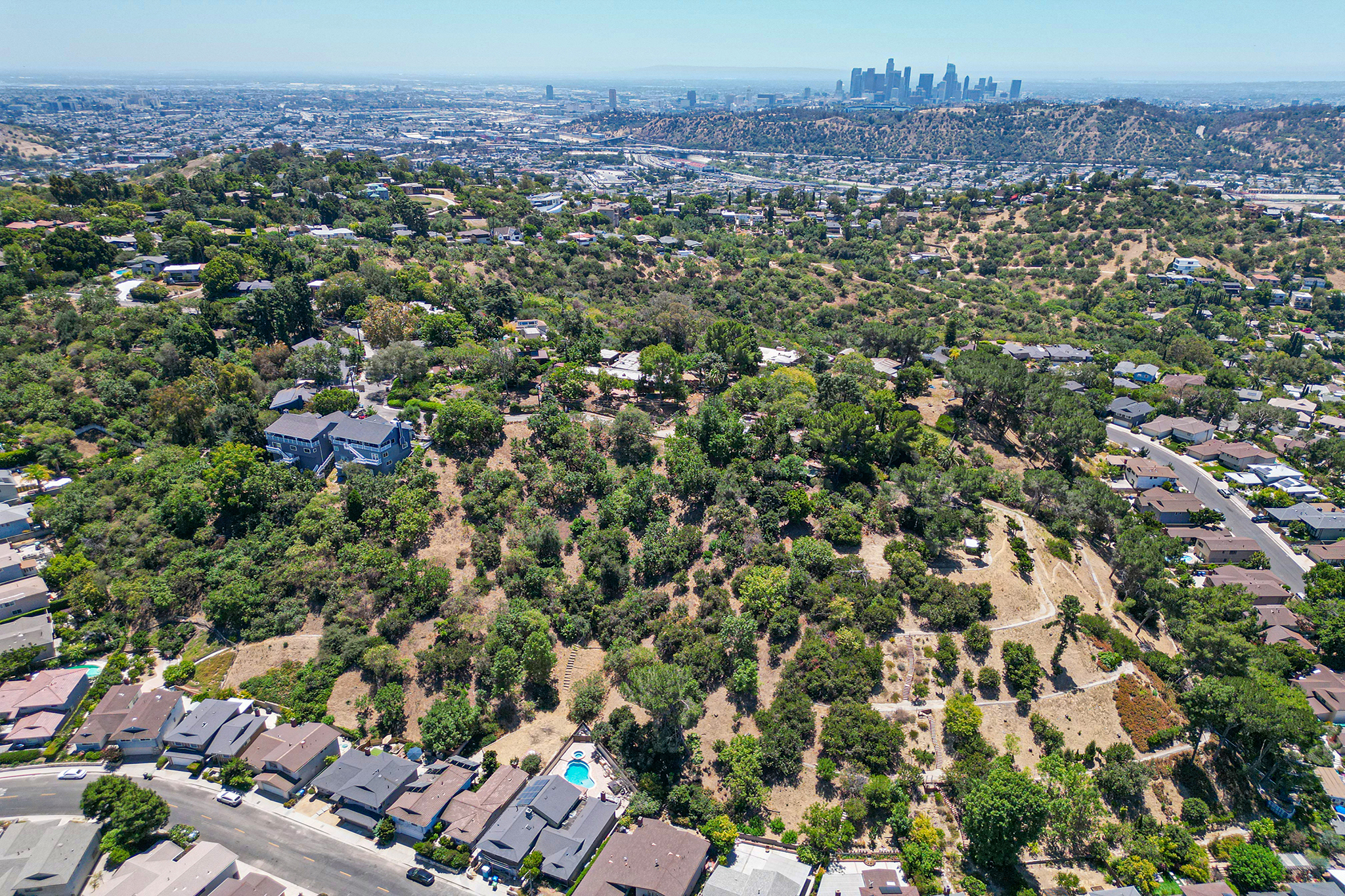 927 Rome Drive ariel view of hillside and DTLA skyline